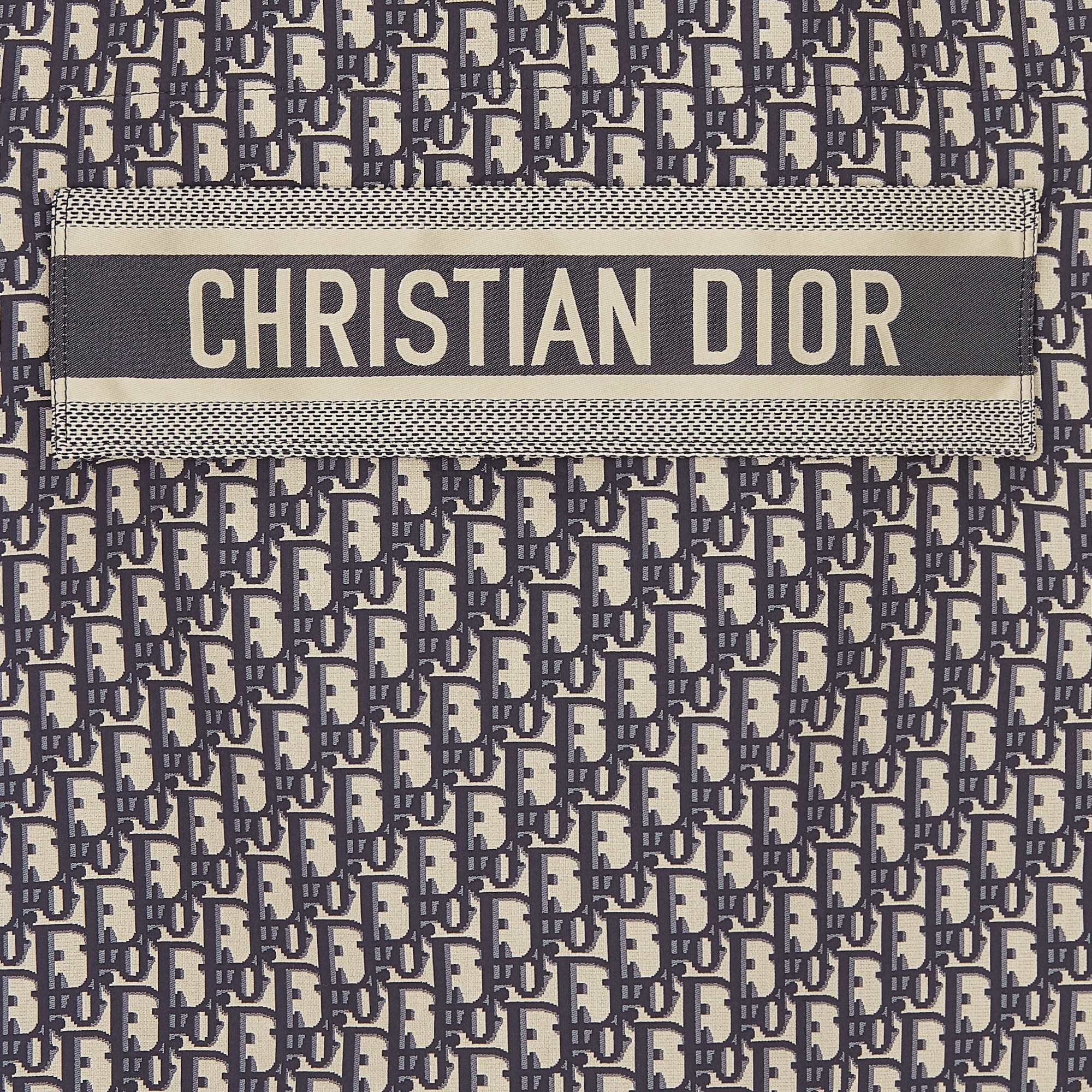 连帽厚夹克 蓝色和米白色塔夫绸提花科技面料 Oblique 印花 E09