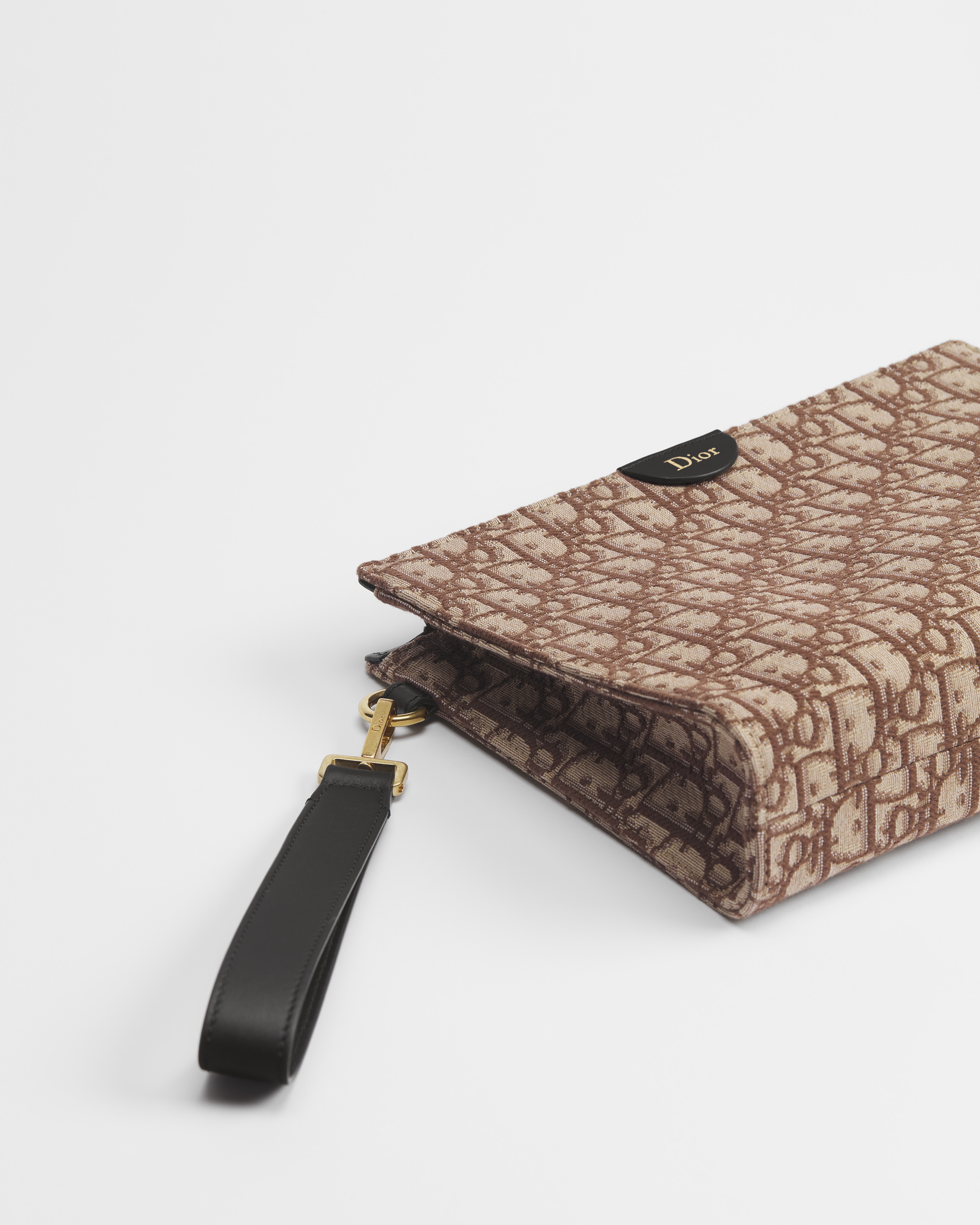 A5 三角形手拿包 棕色 Oblique 印花面料 E10