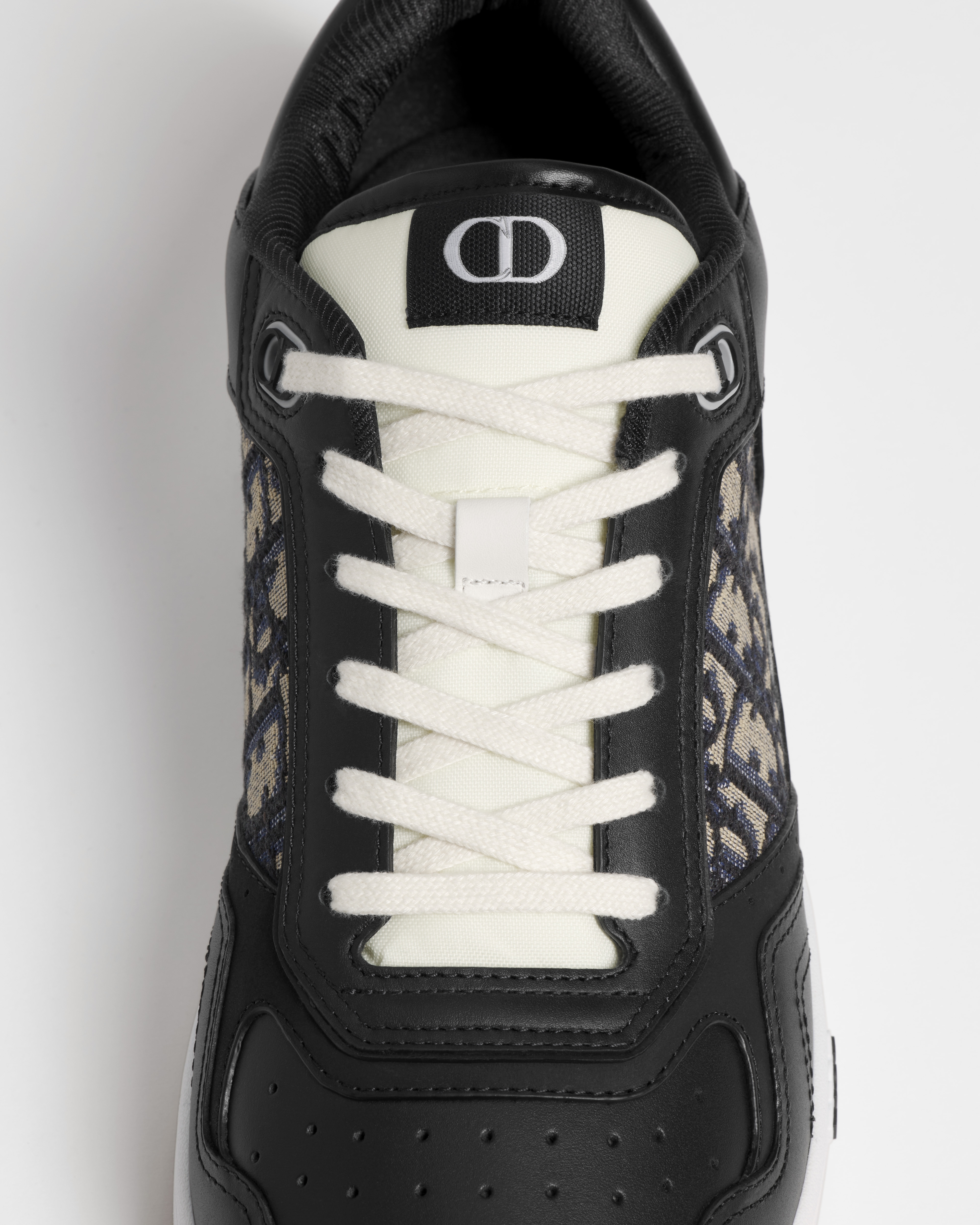 B27 Uptown 低帮运动鞋 黑色光滑牛皮革搭配米色和黑色 Oblique 印花面料 E11