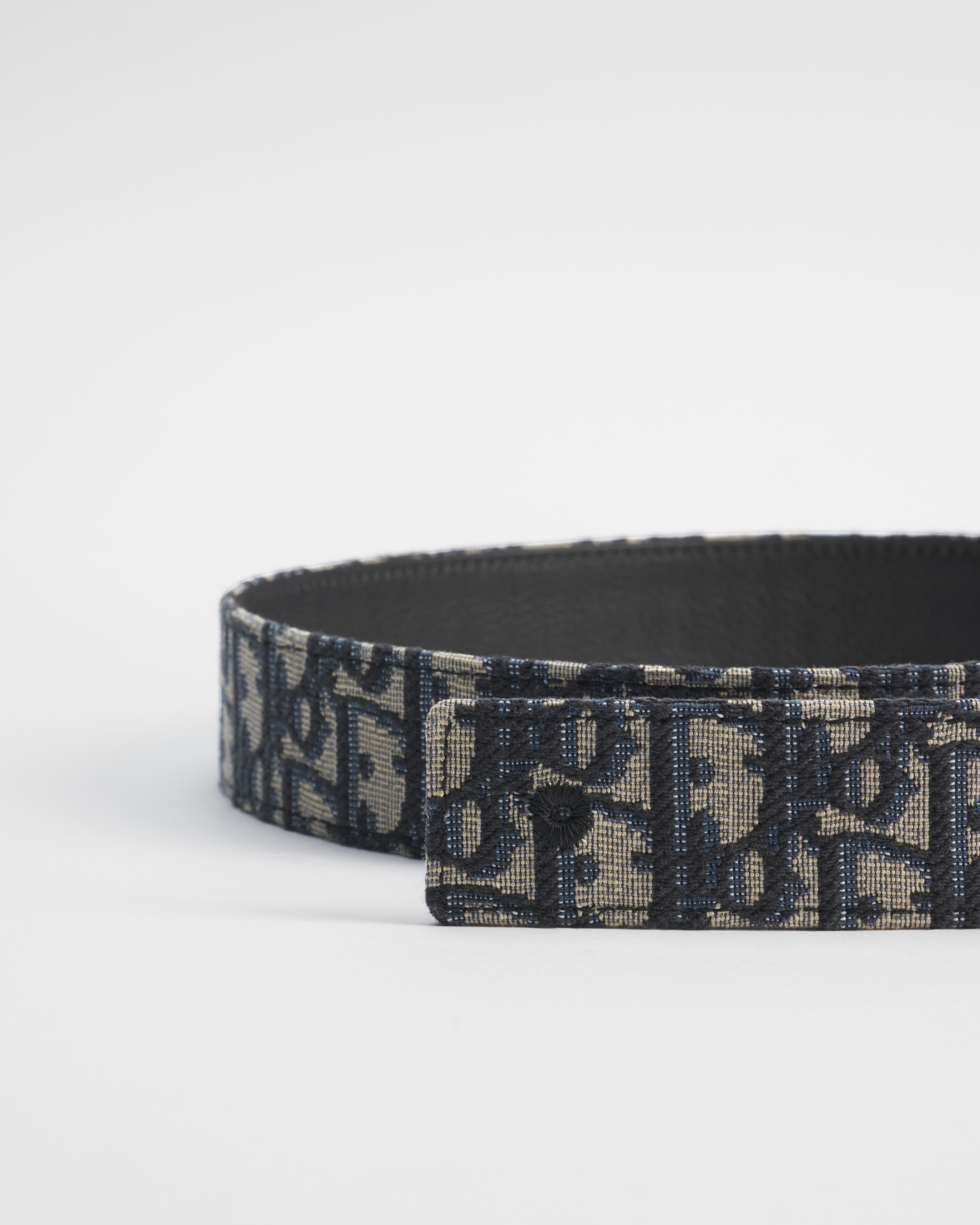 双面腰带 35 毫米米色和黑色 Oblique 印花面料和黑色粒面牛皮革 E09