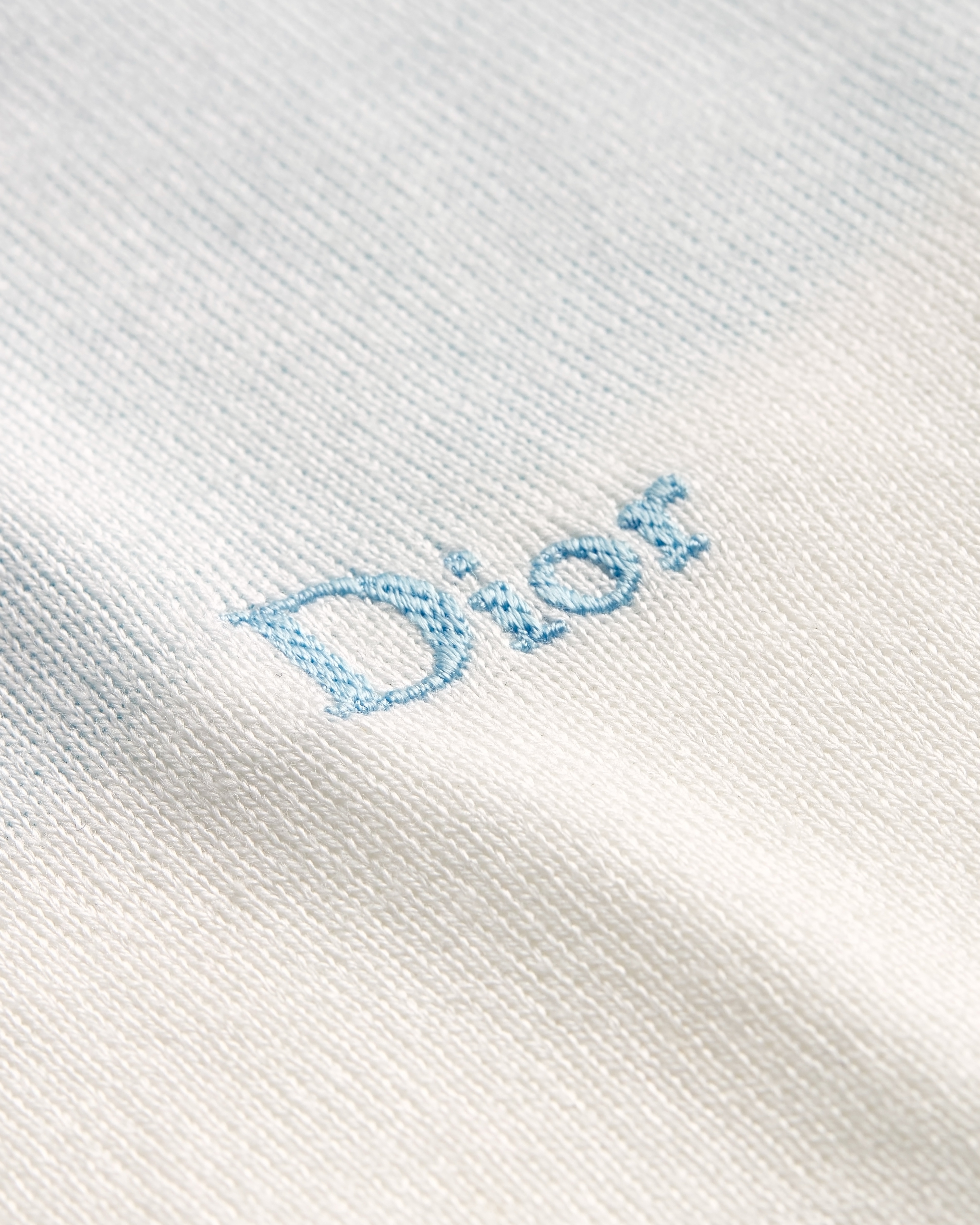 长袖 Polo 衫 蓝色和米白色棉质针织面料 Dior Marinière 图案 E10