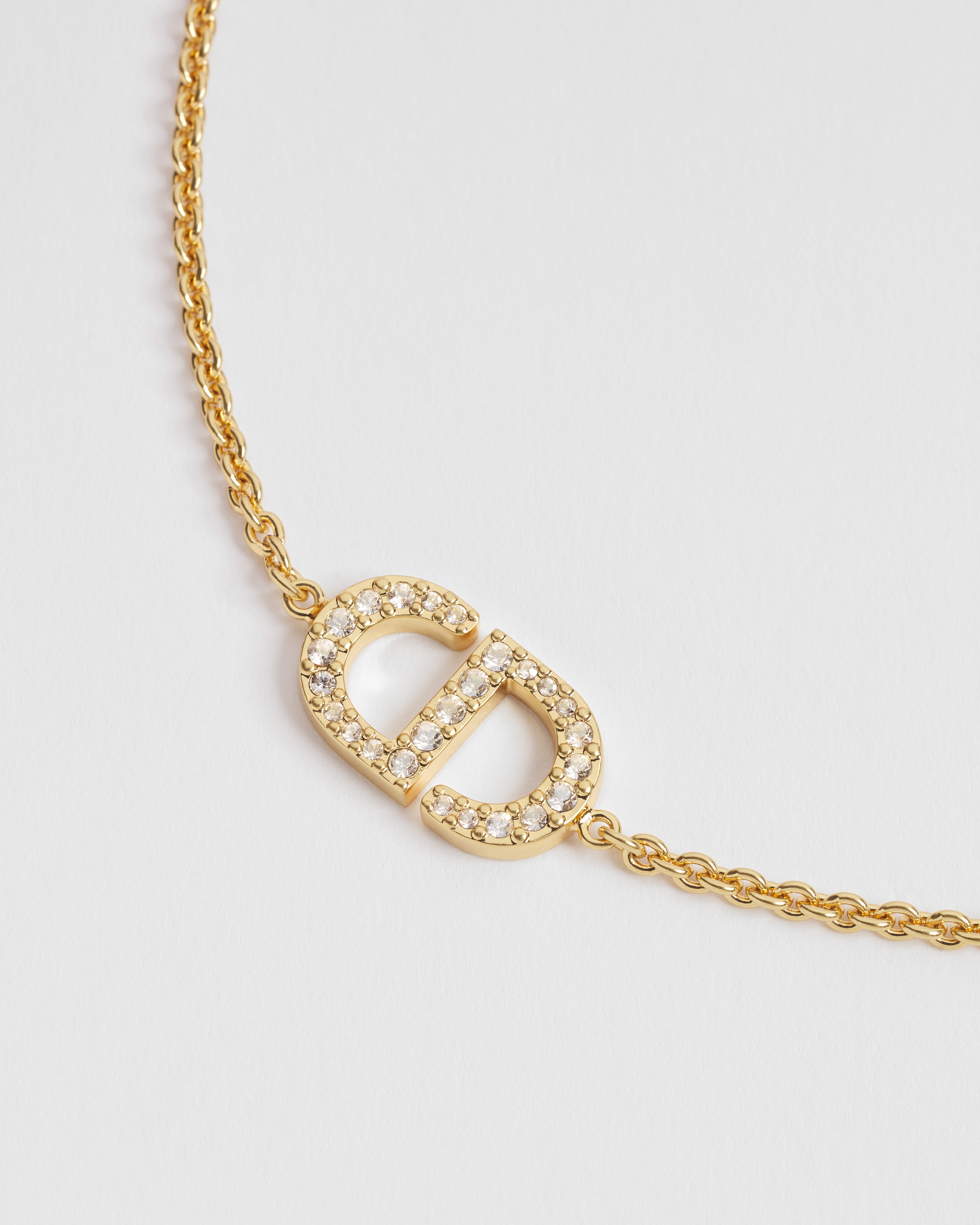 Petit CD 手链 金色饰面金属和银色调仿水晶装饰 E09