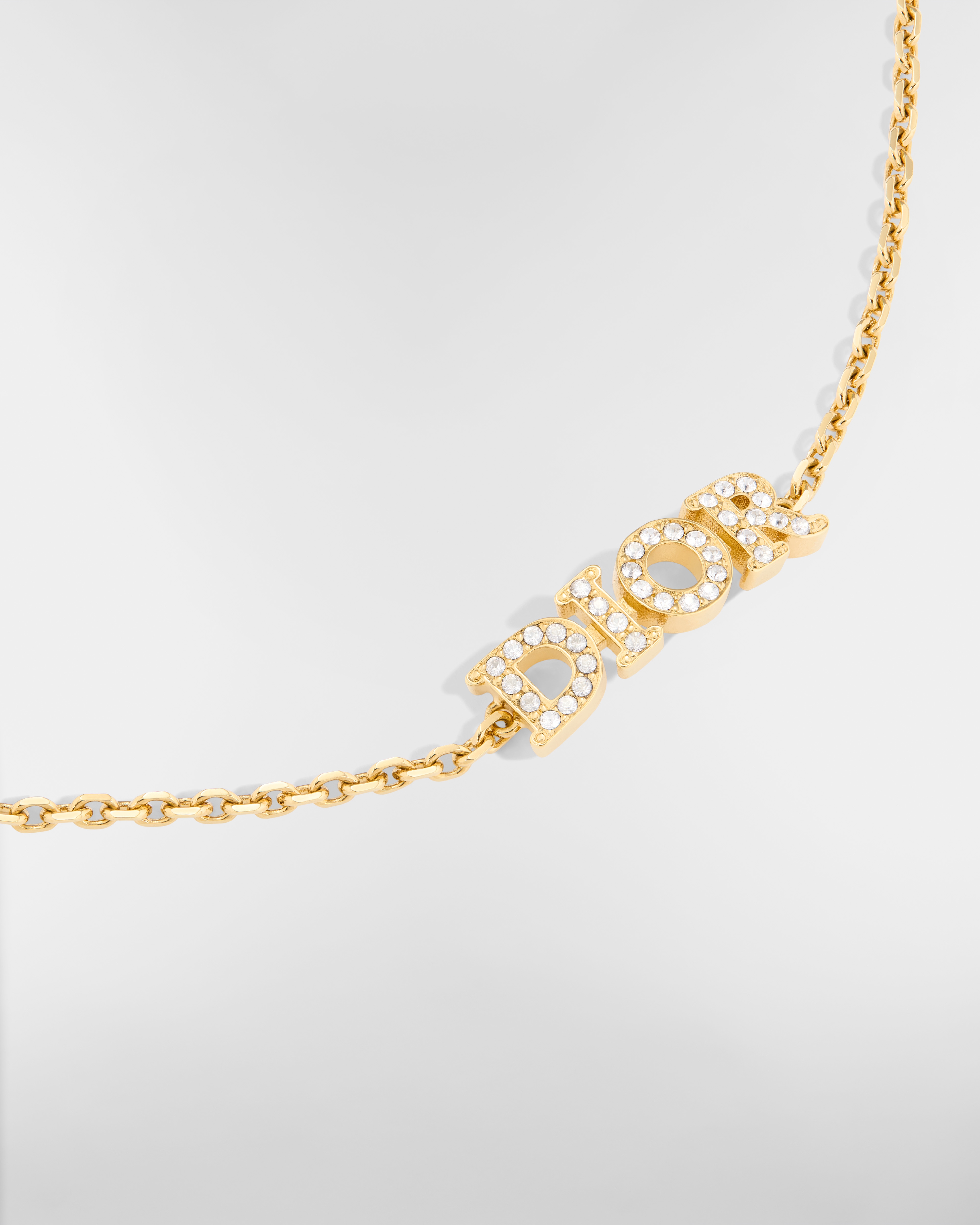 Dio(r)evolution 手链 金色饰面金属和银色调晶体装饰 E09