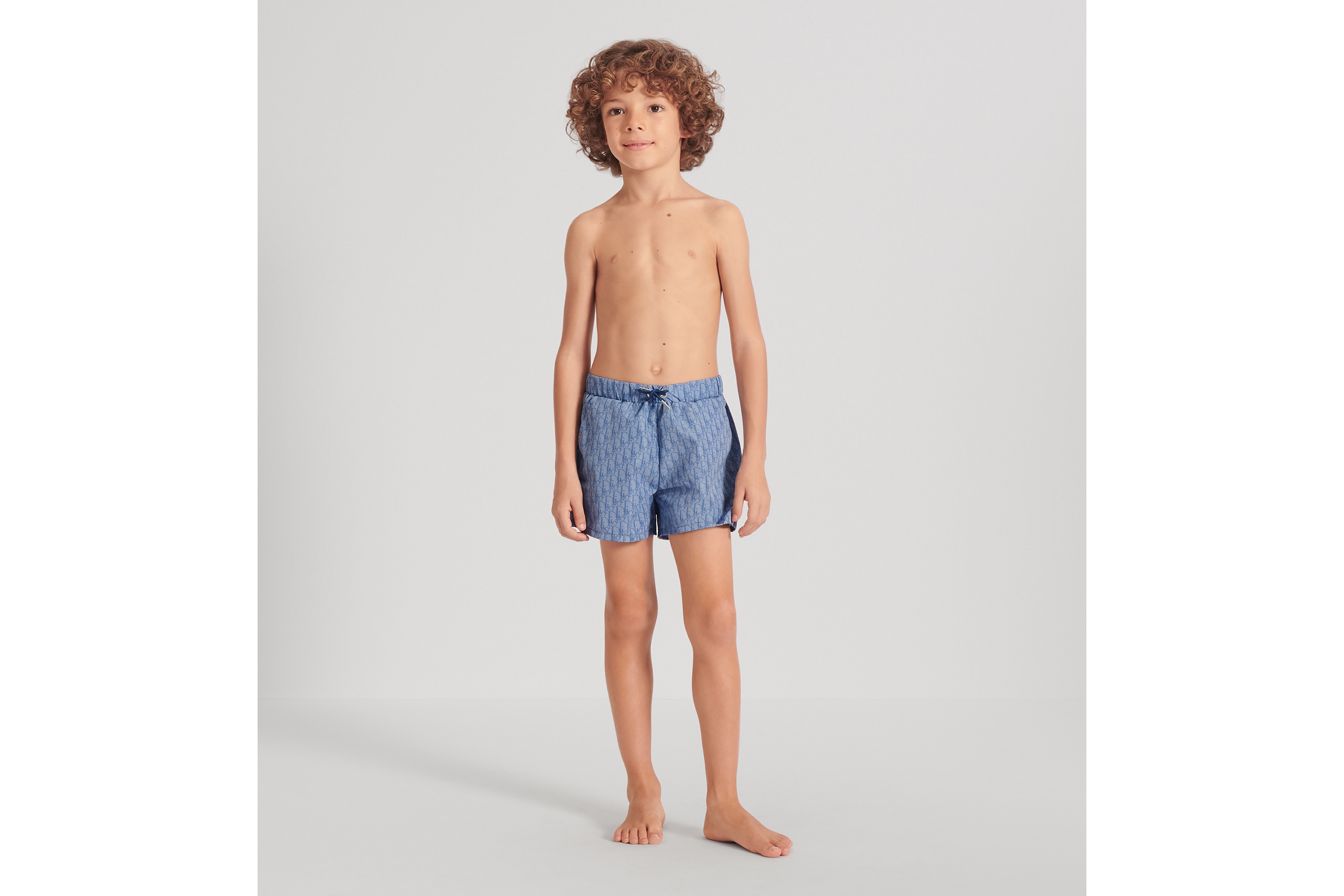 look_image_alt_prefix 儿童泳装短裤 淡蓝色科技面料 Oblique 印花 E01