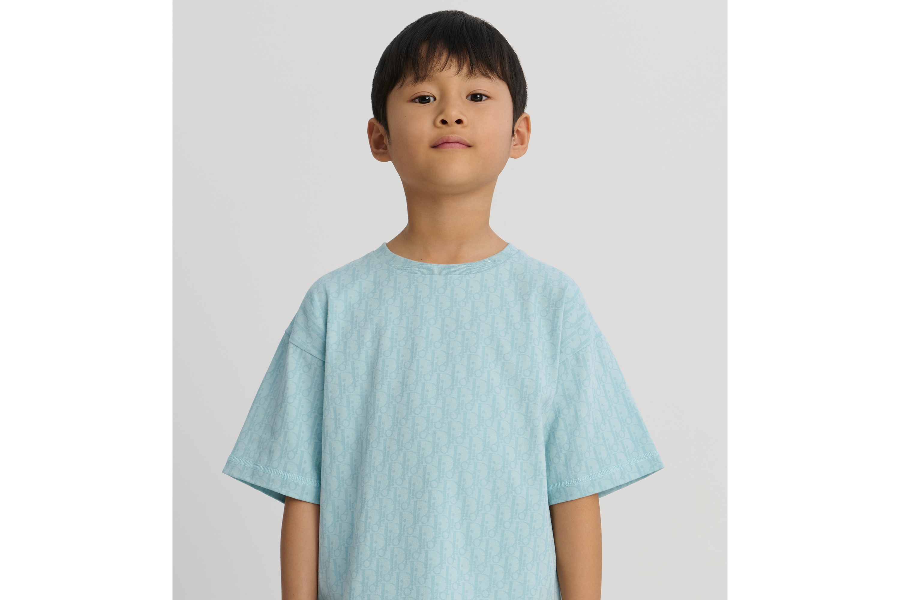 look_image_alt_prefix 儿童 T 恤 水蓝色棉质混纺平纹针织面料 Oblique 印花 E02