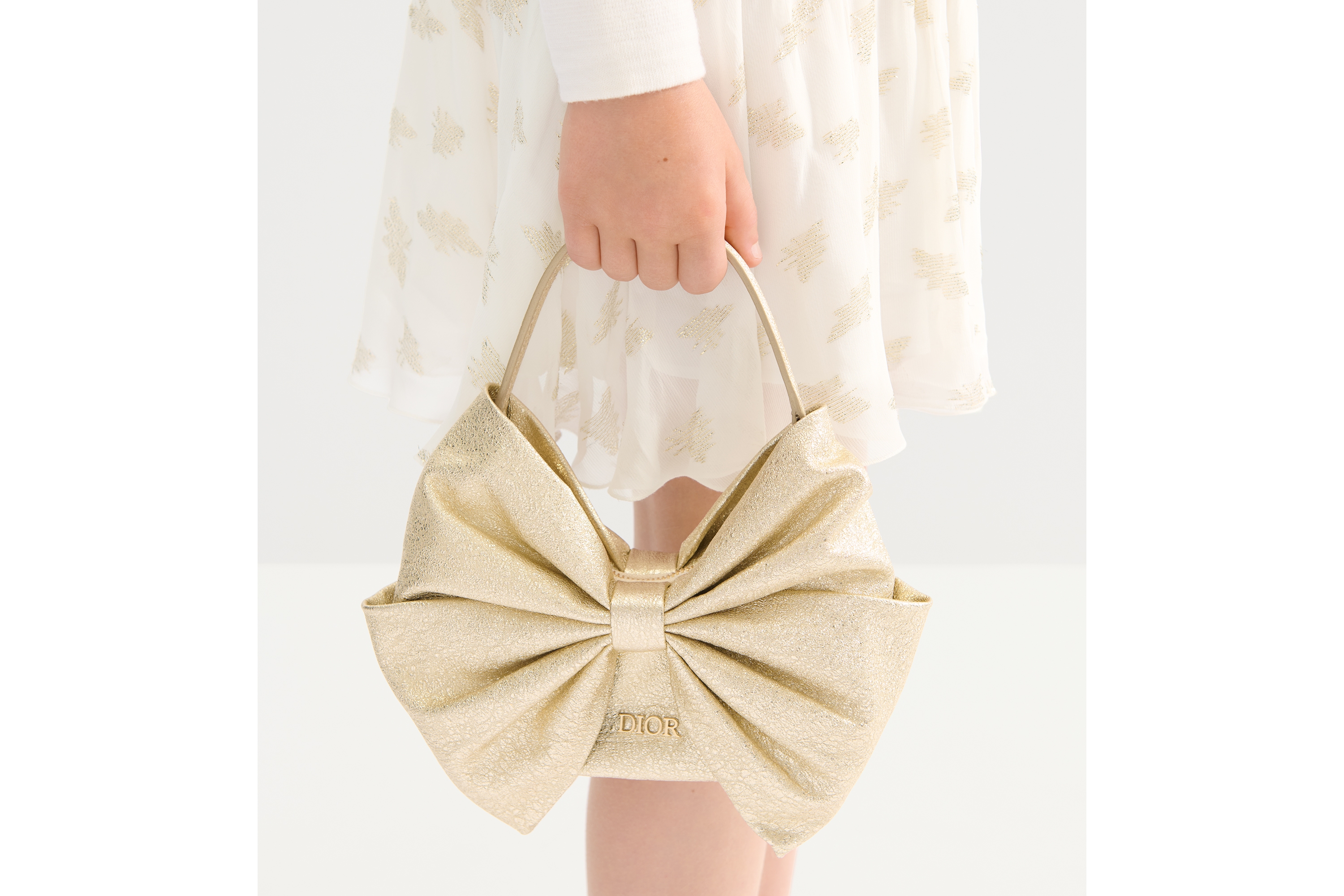 儿童蝴蝶结造型手袋 金色调金属光泽羊皮革 E20