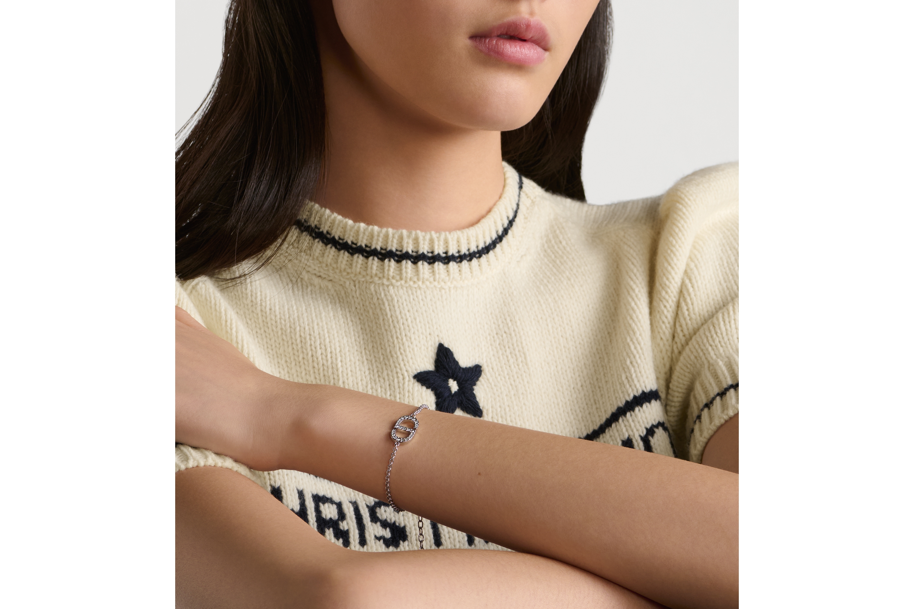 Petit CD 手链 银色饰面金属和闪亮晶体装饰 E10