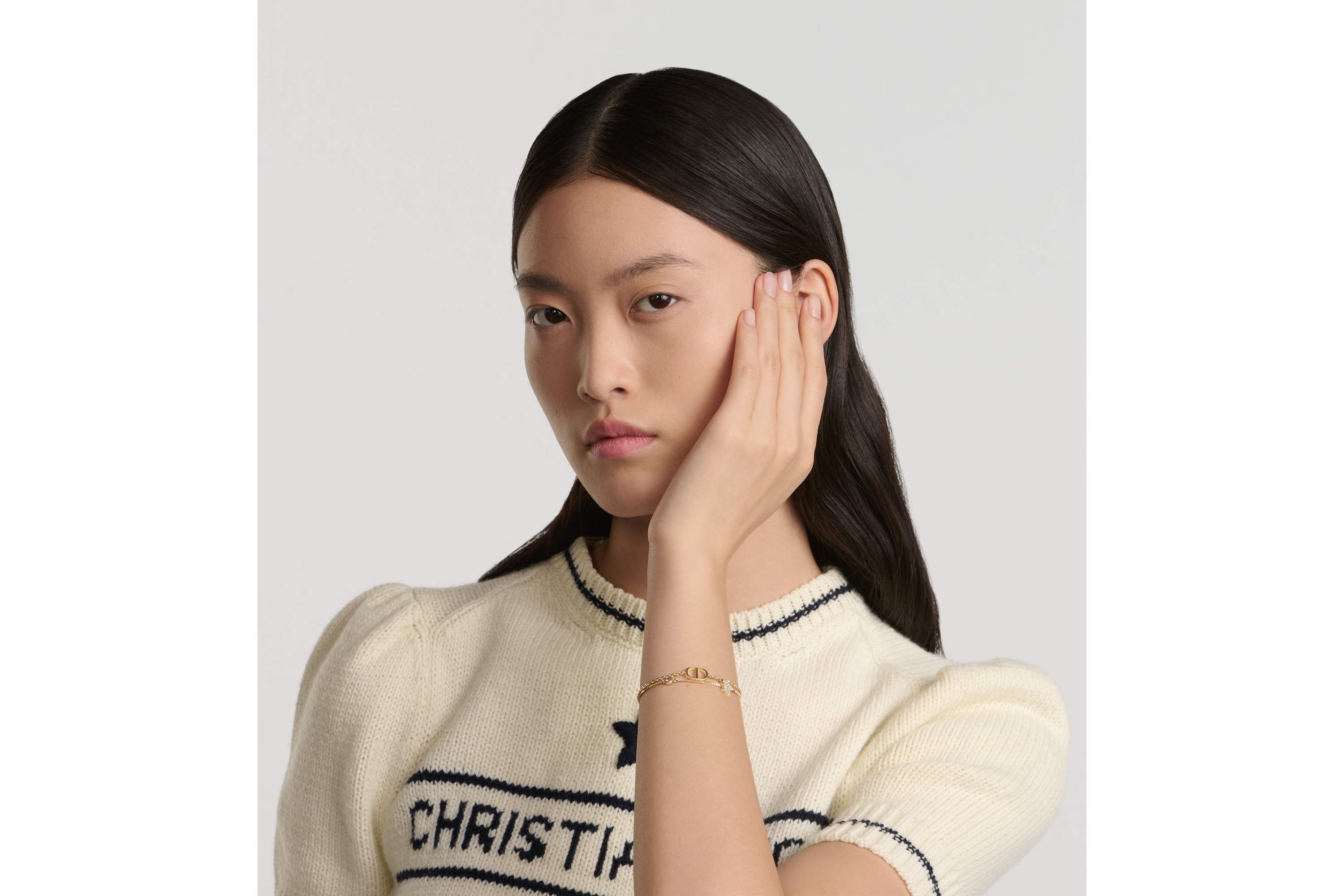 look_image_alt_prefix Petit CD 双链条手链 金色饰面金属和闪亮晶体装饰 E10