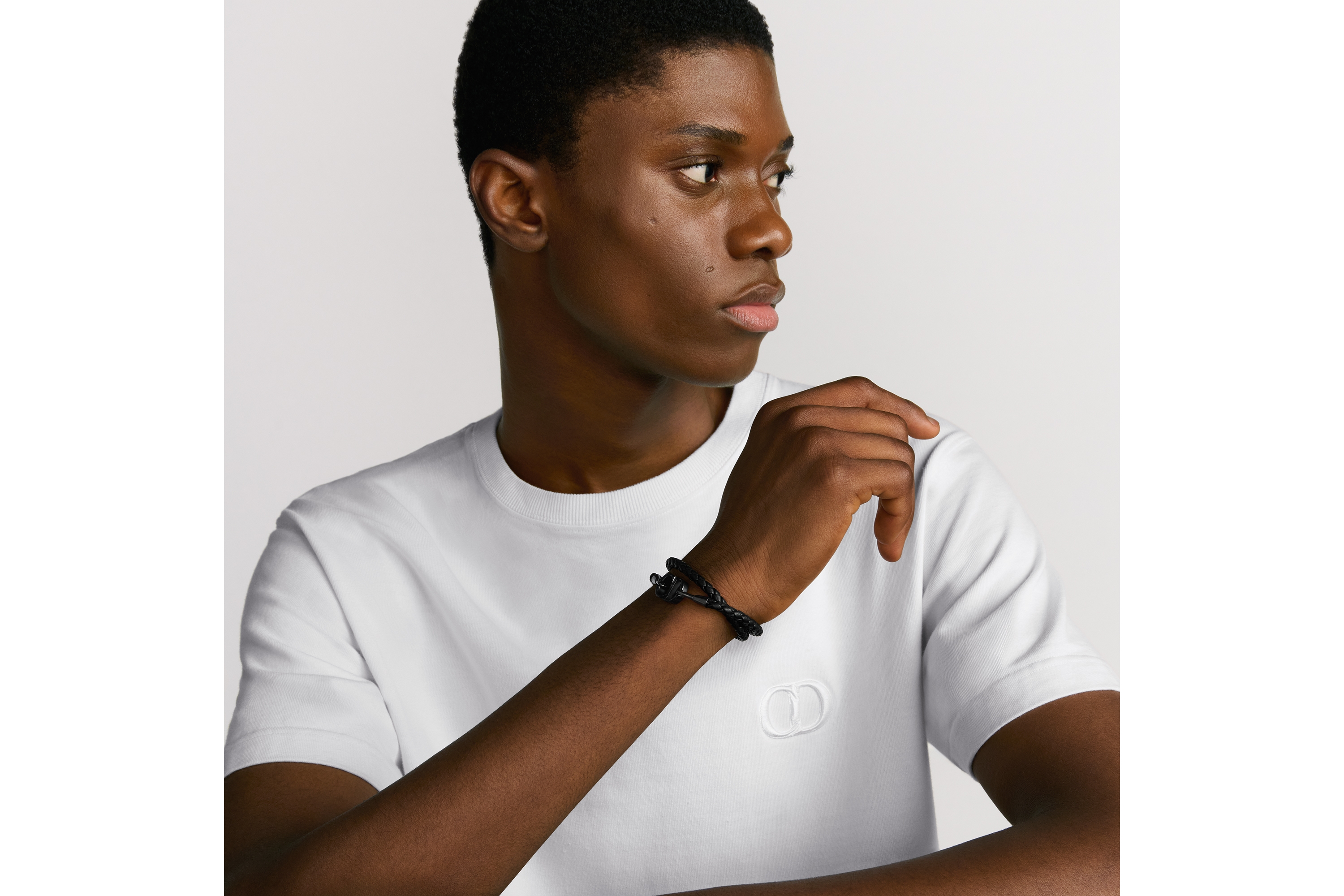 CD Icon 编织皮革双环手链 黑色羊皮革和金属覆层铜合金 E39