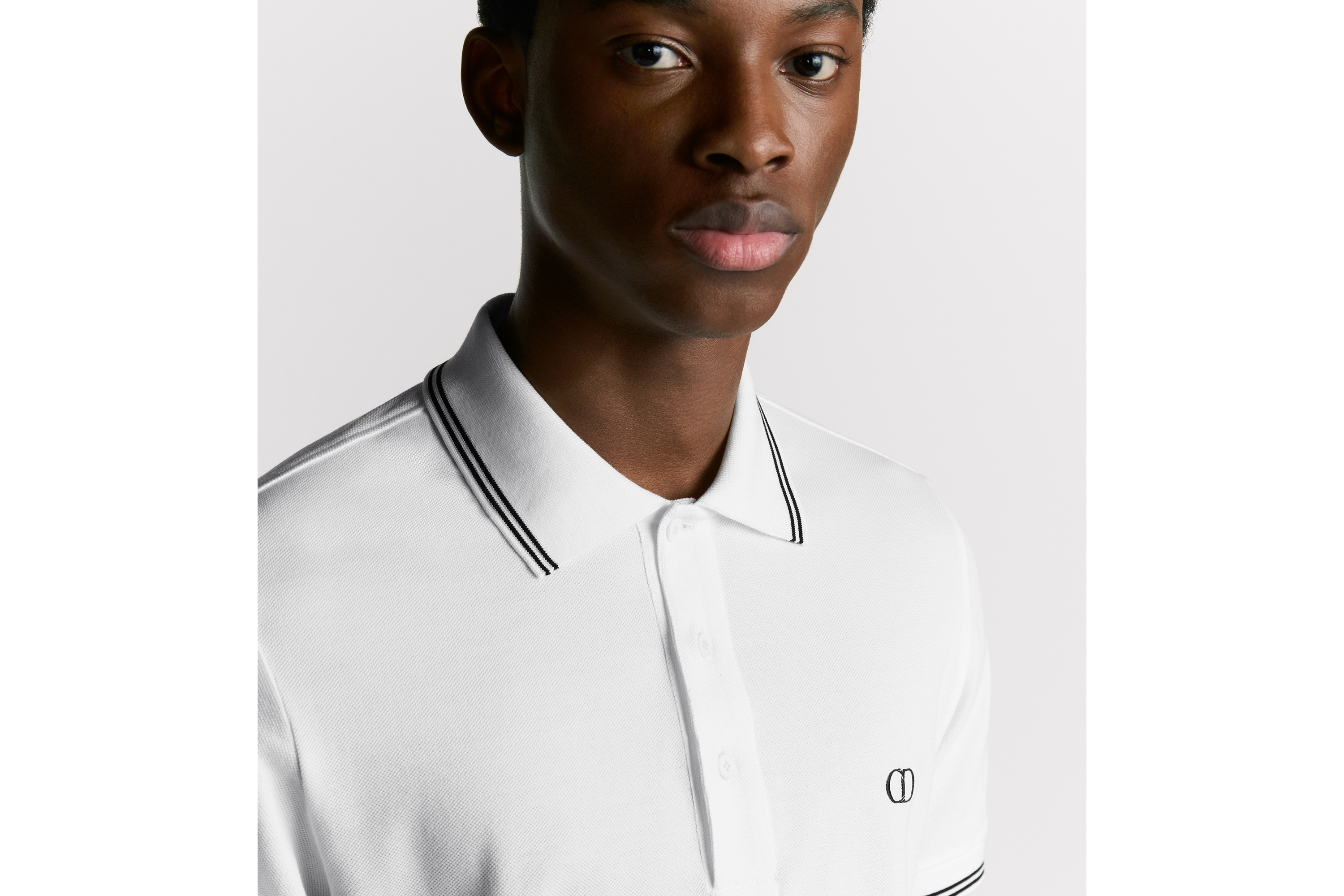 look_image_alt_prefix Polo 衫 白色棉质珠地布 CD Icon 标志 E10