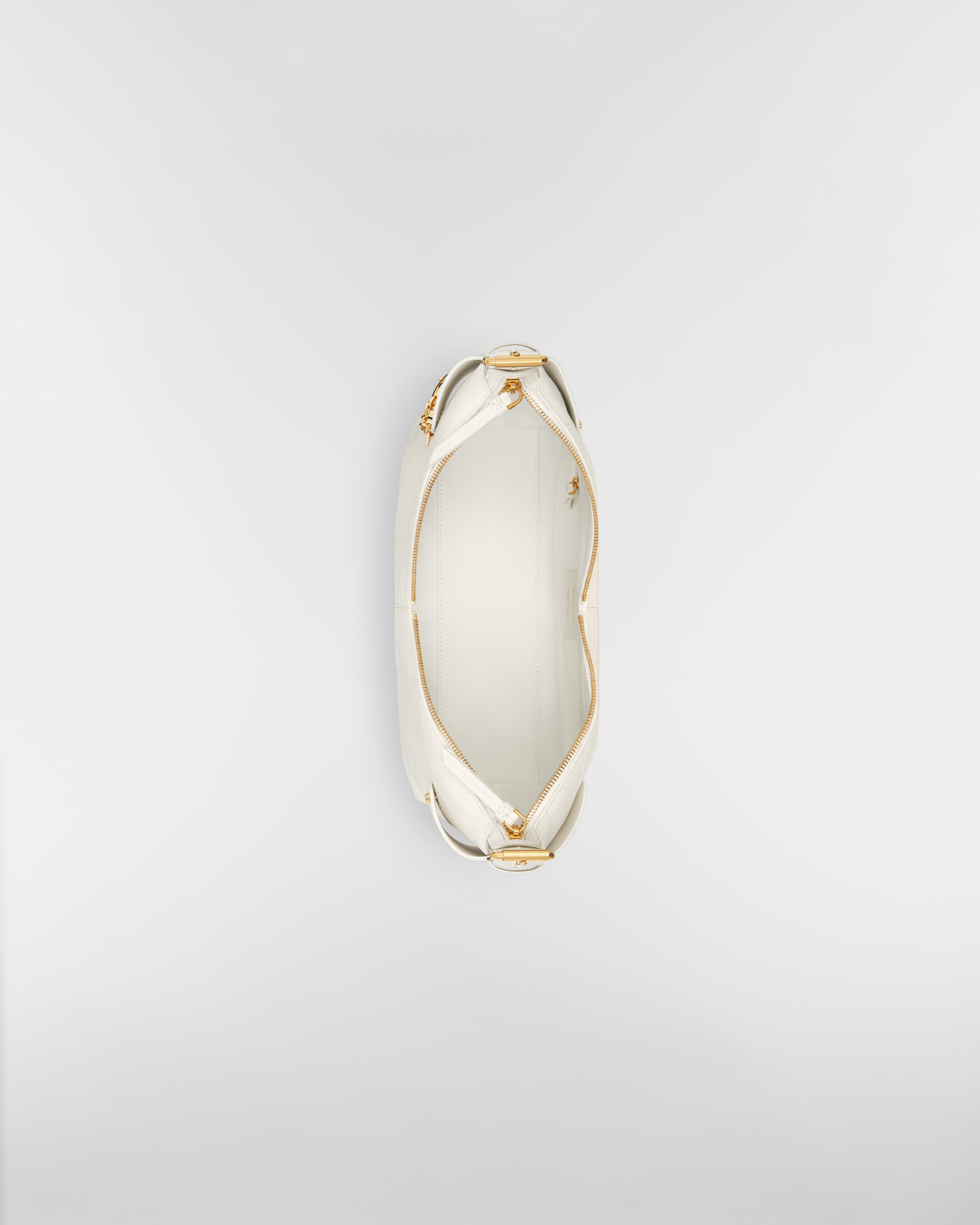 中号 Dior Voyage 手袋 奶白色粒面牛皮革扁平超大藤格纹 E06