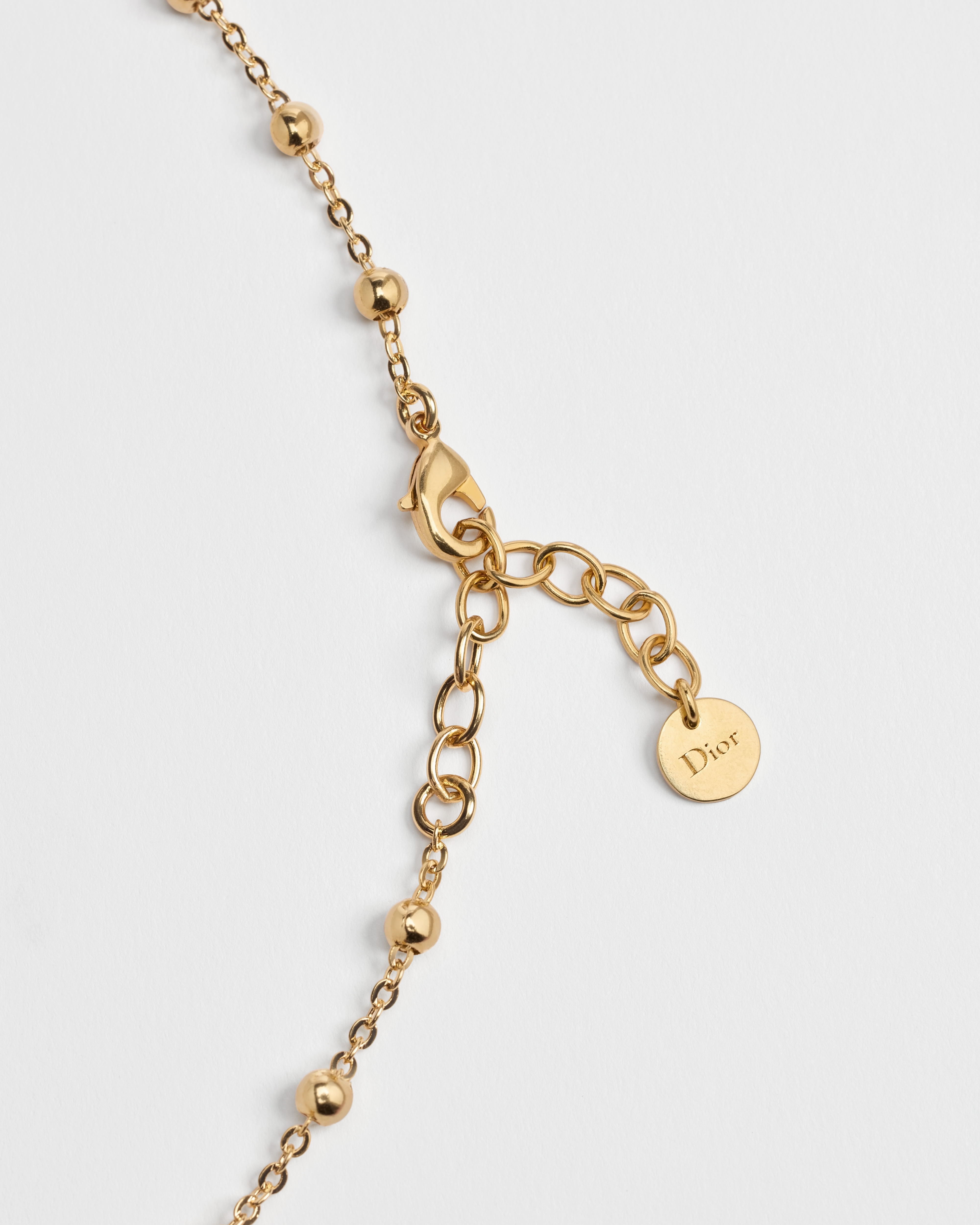 Lucky Dior 项链 金色饰面金属和白色晶体装饰 E10