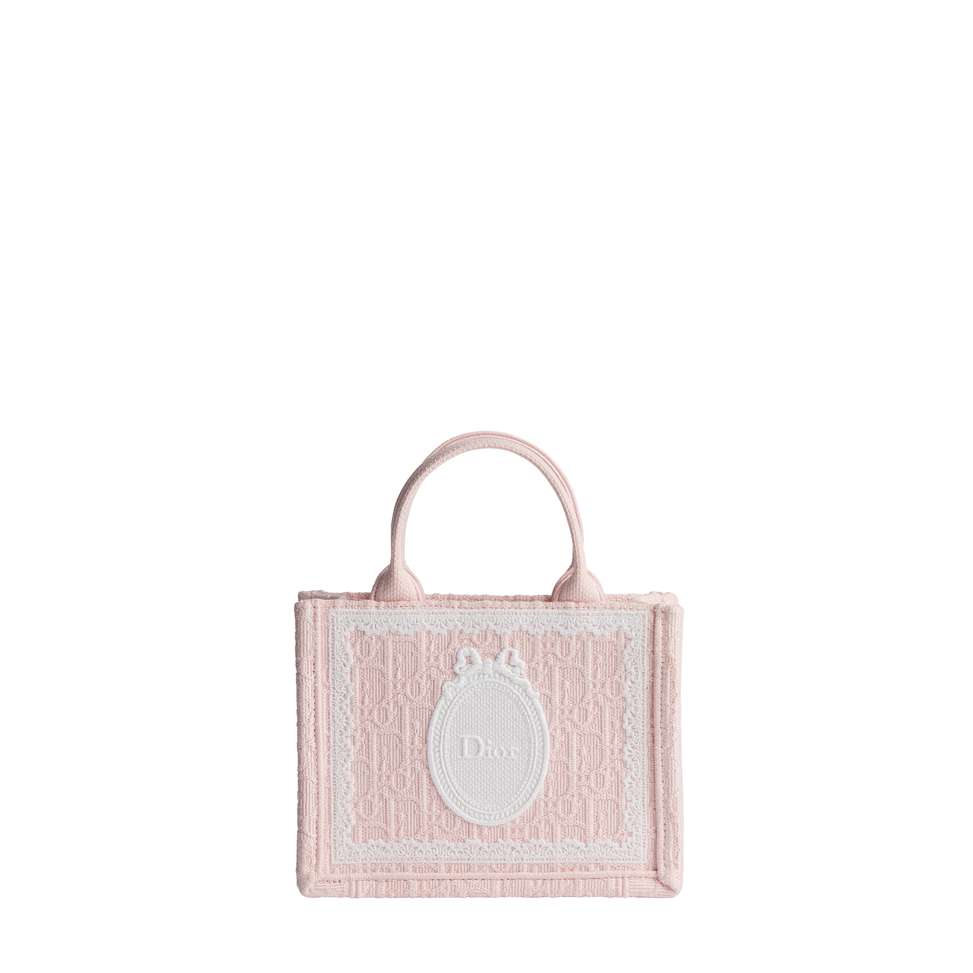  淡柔粉色 Oblique 印花面料搭配白色蕾丝和 Dior Médaillon 标志（21 x 16 x 6.5 厘米）