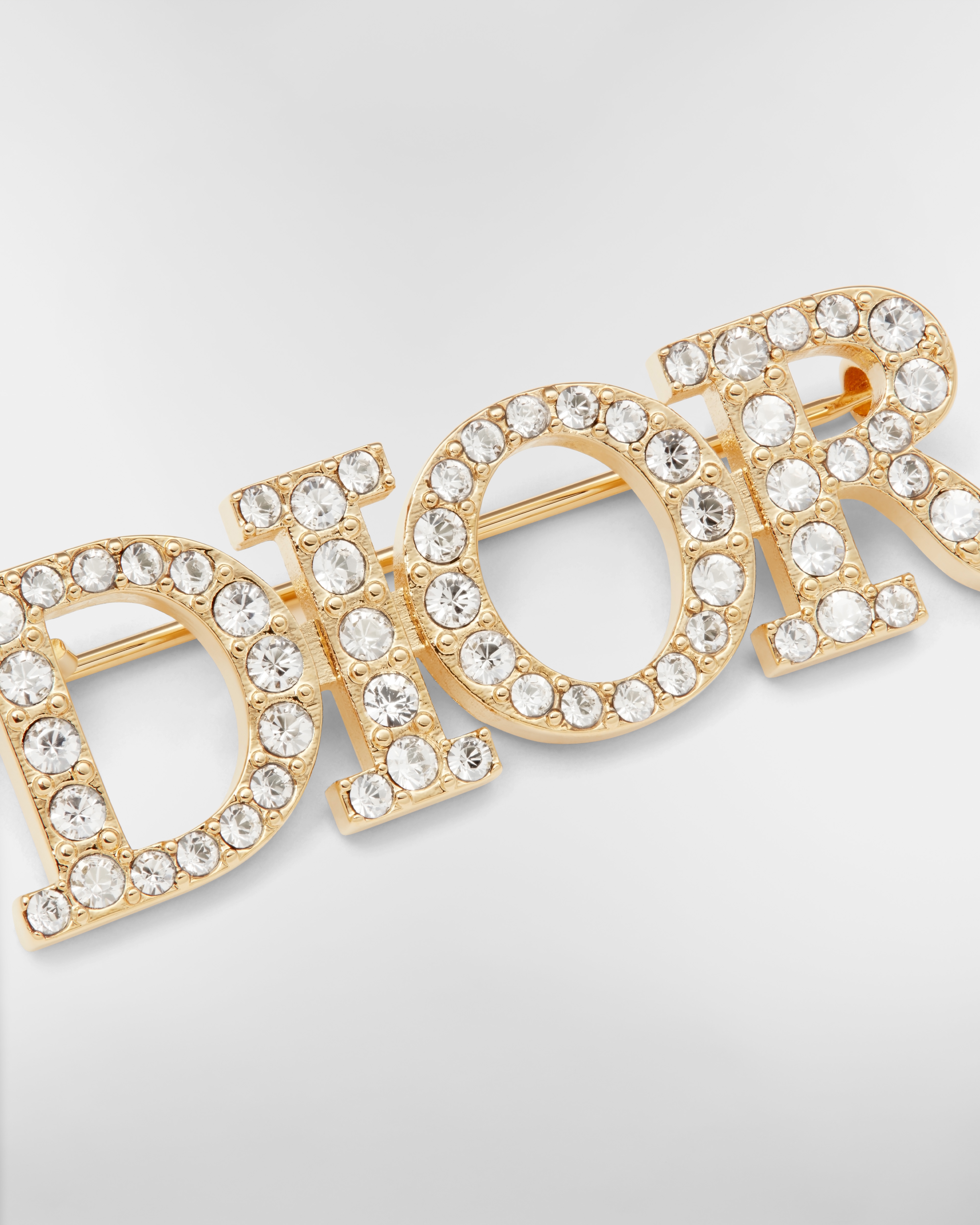 Dio(r)evolution 胸针 金色饰面金属和白色仿水晶装饰 E09